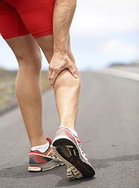 runner with sore calf muscle