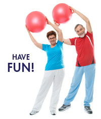 people stretching with exercise balls